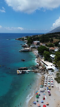 Aerial view of the turquoise Mediterranean coastline connecting Vlore, Radhime and Orikum, Albania