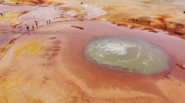 Aerial View of the Devil's Eye Salt Lake in Qinghai, China with Vibrant Mineral Colors and Natural Patterns