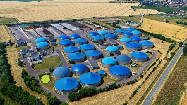 Extensive Aerial View of Large Biogas Plant with Blue Domes