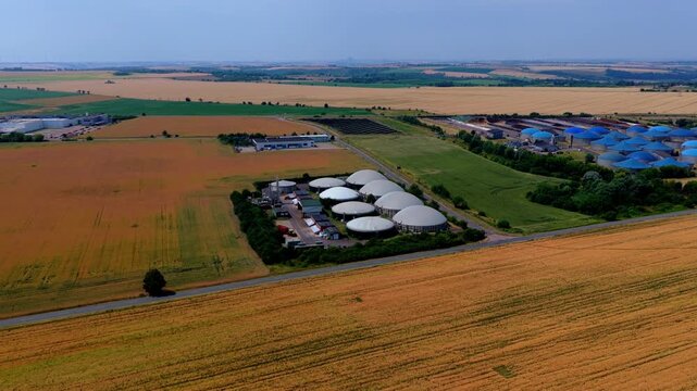 Drone Aerial Video of Full Biogas Plant Complex with Blue and White Domes
