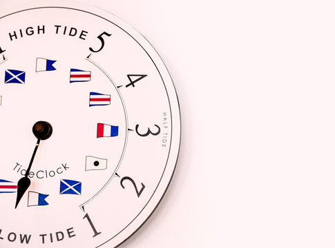 Part Of The Face Of A Tide Time Clock In Devon