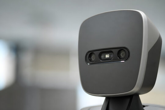 Close up humanoid robot sensor face with copy space