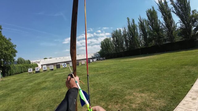 First person view archery practice shooting arrow at target