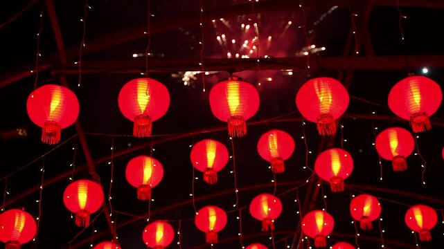 Red Chinese Lanterns Under Night Fireworks Display in China
