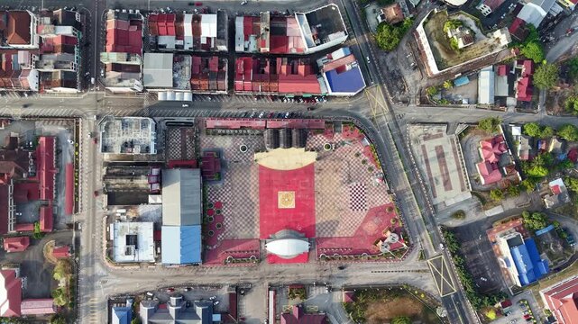 Close-up of the square's red courtyard