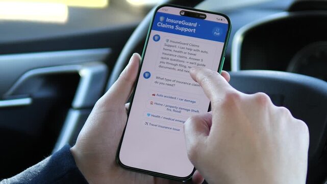 Filing an auto accident claim via mobile chatbot inside a car. Hands selecting options on the insurance support app. Essential footage for roadside assistance and vehicle safety commercials.