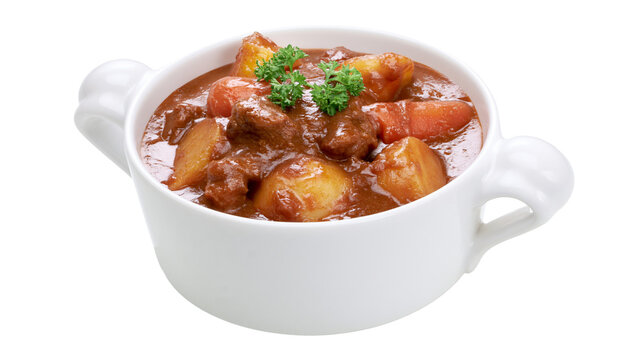 Hearty beef stew with potatoes and carrots in white bowl