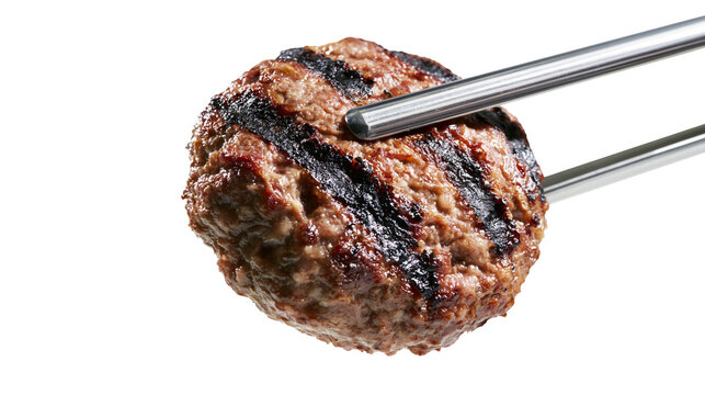 Grilled beef patty with grill marks held by metal tongs
