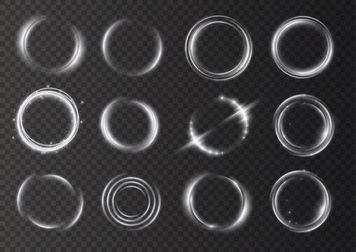 Set of abstract glowing white circular light rings and orbs with abstract collection isolated transparent artistic lighting background technology futuristic radiance