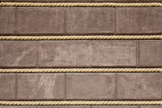 Brown textured tiles form a repeating pattern