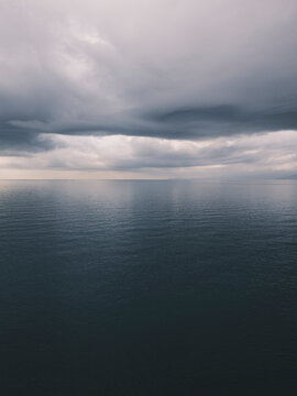 Dramatic sky and peaceful sea at sunrise