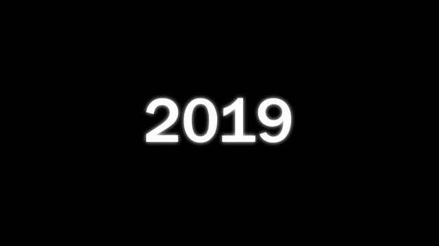 White glowing numbers representing the year 2019 centered on a solid black background for a simple minimalist calendar or time related