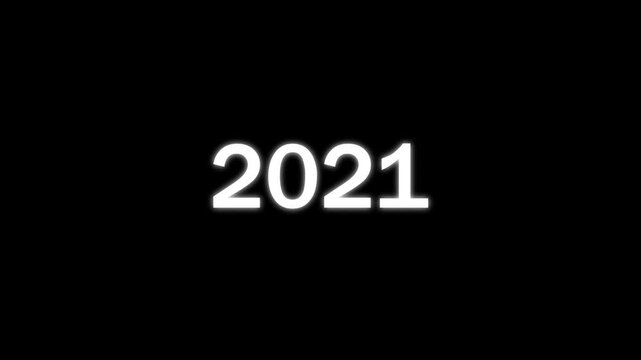 White glowing numbers representing the year 2021 centered on a solid black background for a simple minimalist calendar or time related