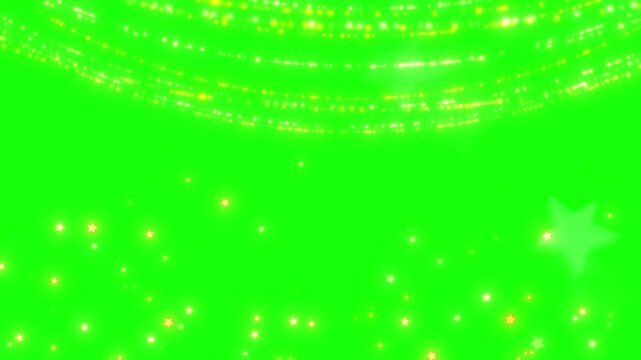 Glowing gold sparks on green screen background