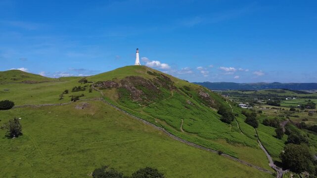 Panoramic aerial view of the historic monument on top of Hoad Hill in Ulverston Cumbria on a Bright summer day