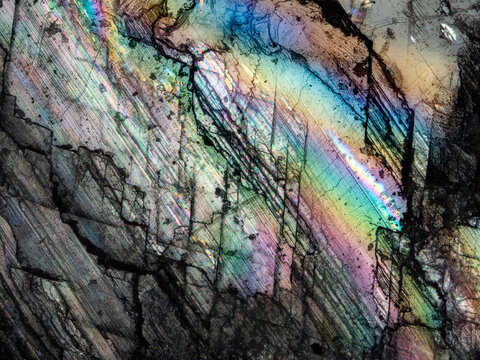 Colorful crystal texture of Iceland spar under reflected light microscope