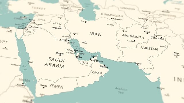 Smooth camera flyover across the Middle East, moving from a wide regional view toward the Persian Gulf and the Strait of Hormuz. Clean atlas-style cartography with country borders, capitals, coastline