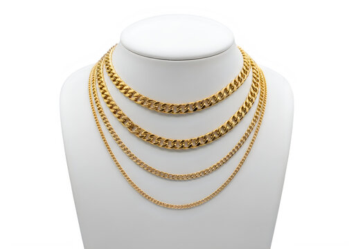 Three layered gold chain necklaces on a jewelry display stand