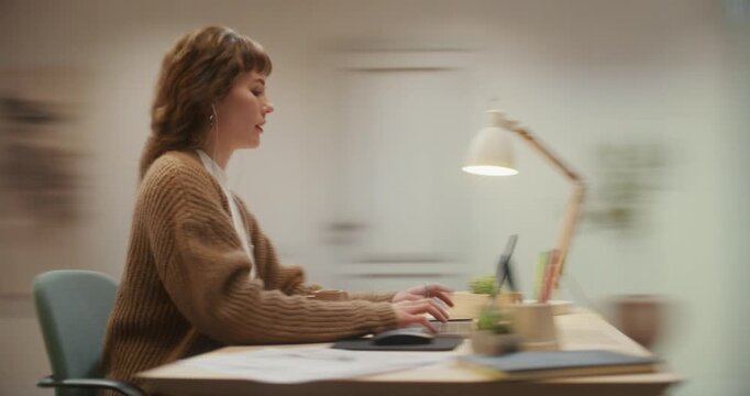 360 Degree Timelapse. Young Caucasian Woman Working Remotely on Laptop Computer at Home Desk, Checking Smartphone, Reading Messages and Browsing Internet While Listening to Music With Earphones