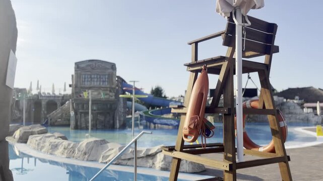 Lifeguard chair by water park pool