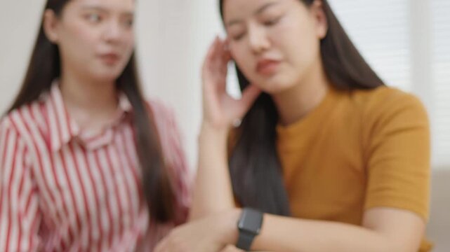 Woman stressed about credit card use while holding multiple cards, ideal for debt, overspending, personal finance problems, budgeting, money anxiety and financial pressure concepts.