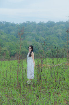 Young Woman in White Outfit Traveling in Khao Yai Thailand Landscape