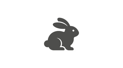 Fototapeta premium Minimalist dark gray silhouette of a sitting rabbit.