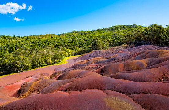 The &ldquo;Seven Coloured Earths&ldquo; are a geological formation and tourist attraction in the Chamarel plain of the Rivi&egrave;re Noire District in Mauritius. Sand in red, brown, violet, green, blue, purple, yellow.