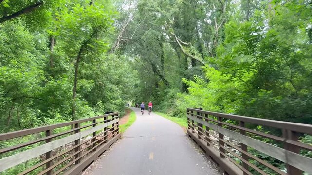 Biking along multi use Swamp Rabbit Trail on the way from Greenville to Travelers Rest in South Carolina