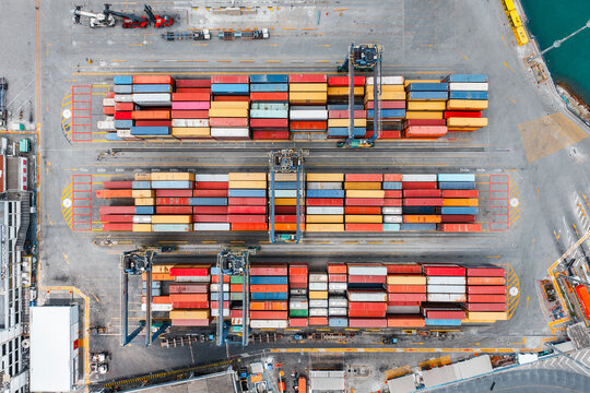 Aerial top view of colorful shipping containers stacked at the port, Salvador, Bahia, Brazil