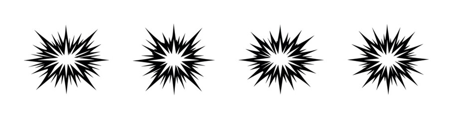 Set of four black starburst explosion graphic elements on a white background © Compositor 