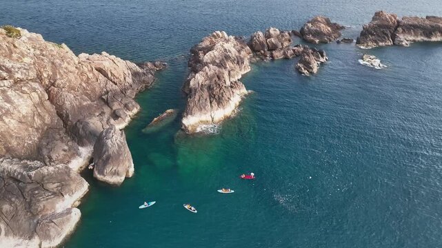 Kayaks and paddleboards at Eo Gio cliffs, Quy Nhon, Binh Dinh, Vietnam