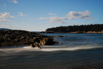 The Atlantic Ocean flows by along the coast of Acadia National Park © Kyle