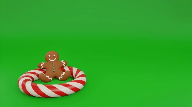 Gingerbread man on candy cane circle festive loop against green screen background