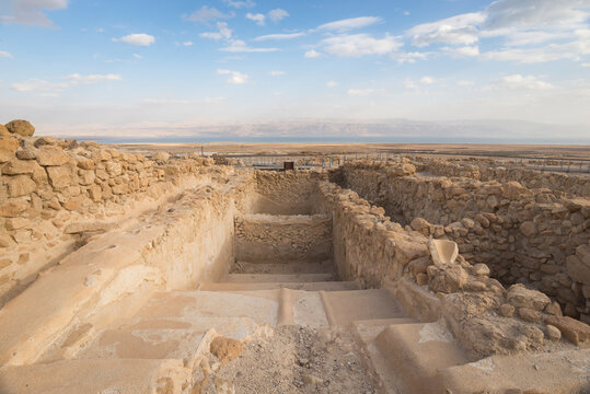 Ancient ritual bath (mikveh) at the archaeological site of Qumran overlooking the Dead Sea.