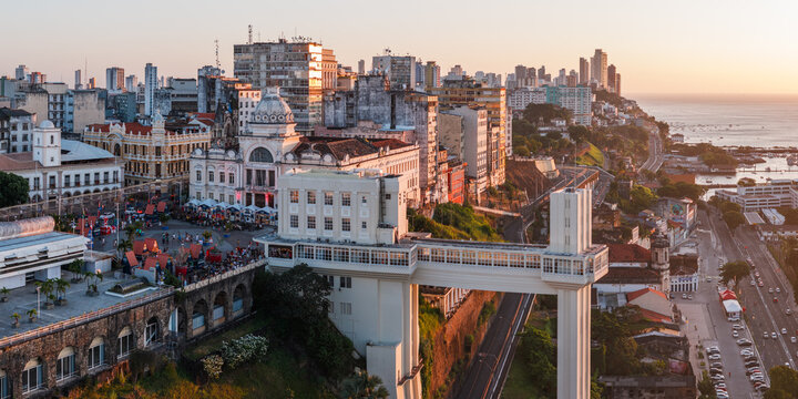 Aerial panorama of the Elevador Lacerda and the lower city at sunset, Salvador, Bahia, Brazil