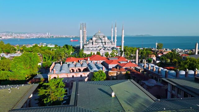 Drone view of the Blue Mosque area in Istanbul, Turkey. Sultanahmet Camii, historic rooftops, gardens and the Bosphorus shape the famous city landscape.