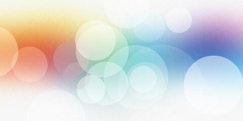 Abstract multi colored background featuring soft overlapping circular bokeh shapes with light gradient and subtle grainy texture. © Sumaia