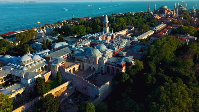 Drone view of Topkapi Palace Museum in Istanbul, Turkey. White palace buildings, green gardens and the nearby waterfront highlight one of the city&rsquo;s most famous historic landmarks.