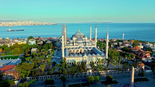 Aerial view of the Blue Mosque in Istanbul, Turkey. Sultanahmet Camii is surrounded by gardens, old city buildings and scenic Bosphorus coastline.