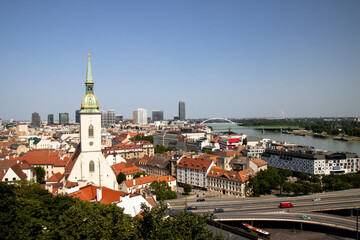 Panoramic cityscape of Bratislava, Slovakia, with St. Martin's Cathedral and Most SNP (UFO Bridge)