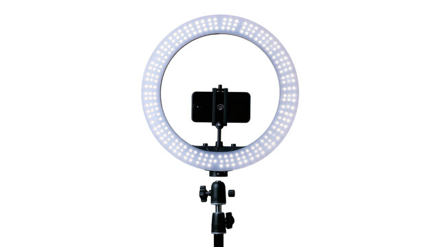 Bright LED ring light with smartphone holder, isolated on transparent background