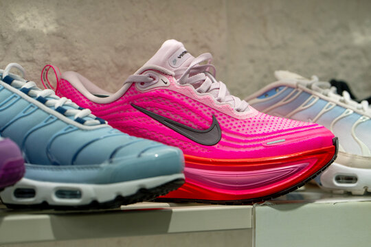 Brand new Nike sneakers shoes. Nike casual sports shoes on showcase in shoe store. Minsk, Belarus - March 30, 2026