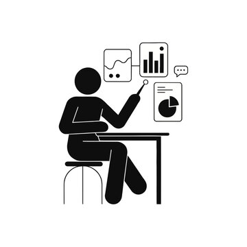 Analyst sitting at a desk reviews financial charts during a corporate performance presentation.