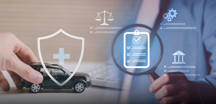 Businessman hand with black car model and medical shield icon. Concepts of auto insurance, vehicle safety, health protection plan, and accident coverage for professional drivers and families.