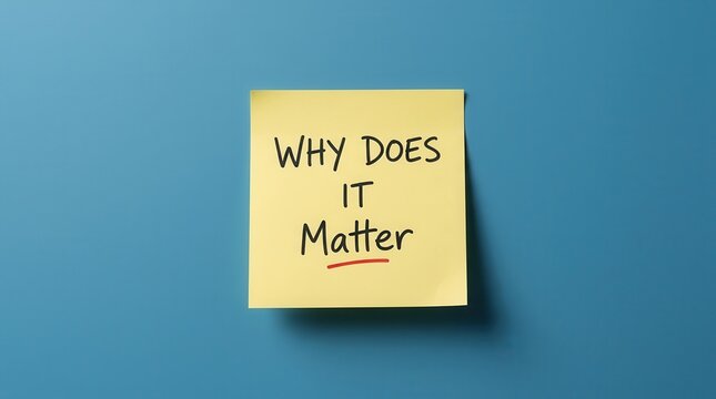 Handwritten message on a yellow post-it note asking WHY DOES IT Matter representing critical thinking.