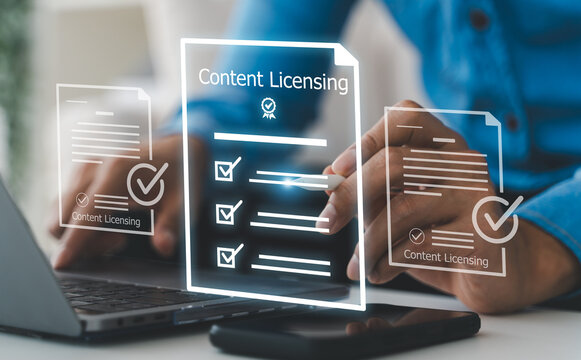 Businessman signing virtual content licensing agreement and digital rights management, AI copyright protection, stock photo video legal certification and intellectual property asset