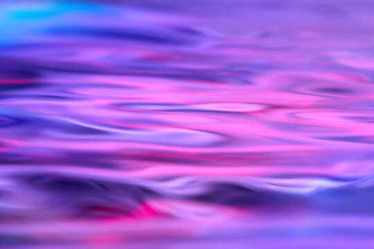 Pink purple wavy liquid abstract background blur