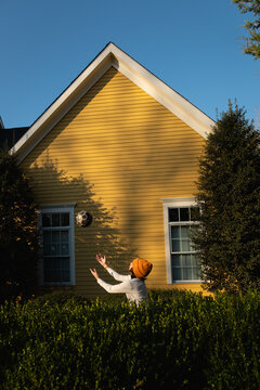 A boy catching a ball