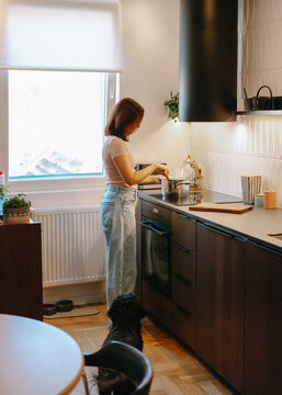 Woman Cooking In The Kitchen